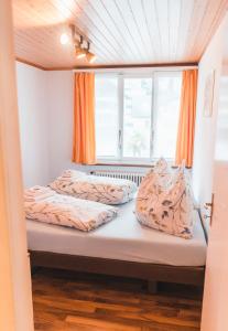 
Ein Bett oder Betten in einem Zimmer der Unterkunft Gasthaus Schäfli
