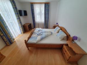 Llit o llits en una habitació de Haus Schattau