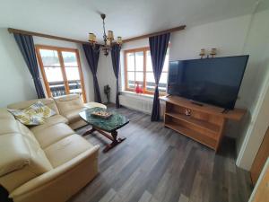 TV a/nebo společenská místnost v ubytování Haus Schattau + 2 fotografie