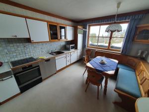 Kuchyň nebo kuchyňský kout v ubytování Haus Schattau