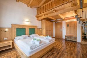 Postel nebo postele na pokoji v ubytování Garni Hotel Bel Vert + 37 fotografií