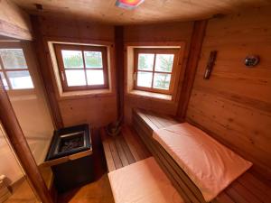A bed or beds in a room at Chalet Sodamin Alpin mit Wellness