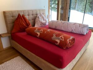 A bed or beds in a room at Chalet Sodamin Alpin mit Wellness