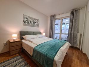 Postel nebo postele na pokoji v ubytování Durmitor