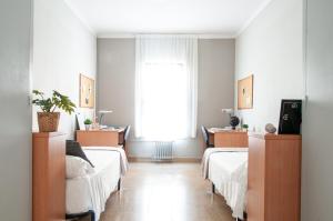 Postel nebo postele na pokoji v ubytování Residencia Universitaria Resa Sant Jordi