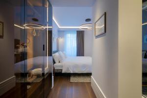 Postel nebo postele na pokoji v ubytování Mert Boutique Hotel