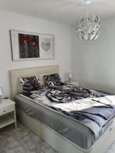 A bed or beds in a room at IRiS DEL MAR