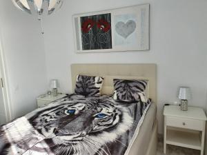 A bed or beds in a room at IRiS DEL MAR