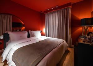 Postel nebo postele na pokoji v ubytování Mert Boutique Hotel