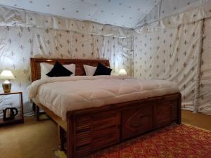 Ένα ή περισσότερα κρεβάτια σε δωμάτιο στο Omya Forest Camps