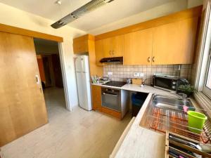 Una cocina o zona de cocina en 3Bdr apt Pizza Hut By Platform 357