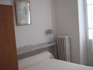 Voodi või voodid majutusasutuse Maison d'hôtes San Pedru toas