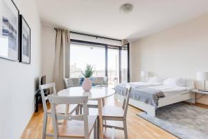 Posteľ alebo postele v izbe v ubytovaní JT's Apartments Korunní str.