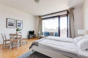 Posteľ alebo postele v izbe v ubytovaní JT's Apartments Korunní str.