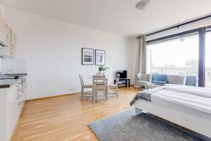 Posteľ alebo postele v izbe v ubytovaní JT's Apartments Korunní str.