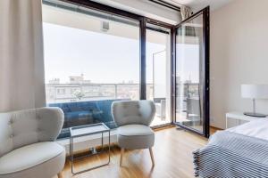 Posteľ alebo postele v izbe v ubytovaní JT's Apartments Korunní str.