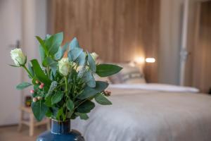 Ένα ή περισσότερα κρεβάτια σε δωμάτιο στο Bel aparté, cosy, vue panoramique cathédrale