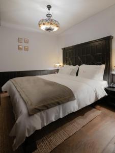 Postel nebo postele na pokoji v ubytování Mert Boutique Hotel
