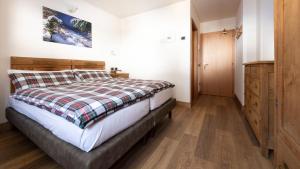 Postel nebo postele na pokoji v ubytování Hotel Compagnoni