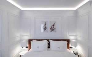 Postel nebo postele na pokoji v ubytování Mert Boutique Hotel