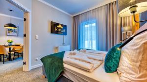 Posteľ alebo postele v izbe v ubytovaní Apartamenty VIP Centrum - Wczasowa 17 by Royal Aparts