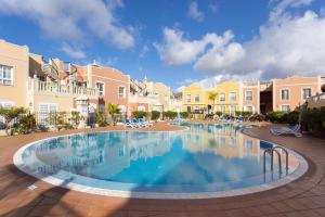 The swimming pool at or close to Home2Book Palm Beach & Relax