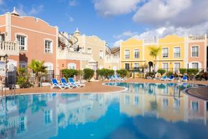 The swimming pool at or close to Home2Book Palm Beach & Relax