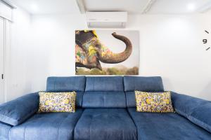 A seating area at Home2Book Palm Beach & Relax