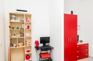 Televízia a/alebo spoločenská miestnosť v ubytovaní Apartment Caceris