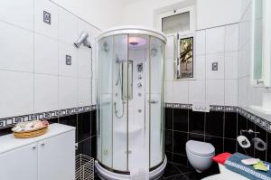Kúpeľňa v ubytovaní Apartment Caceris