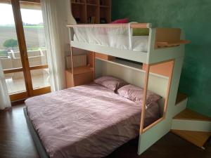 Posteľ alebo postele v izbe v ubytovaní Appartamento B&B Orizzonti