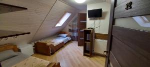 TV a/nebo společenská místnost v ubytování U Stozi Hotel