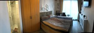 Een bed of bedden in een kamer bij Hotel Pieter de Coninck