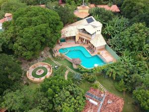 The swimming pool at or close to Lendas do Capão Pousada