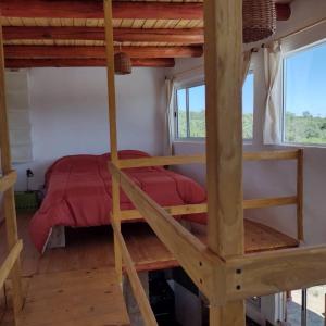 Voodi või voodid majutusasutuse Cosmos Tiny House toas