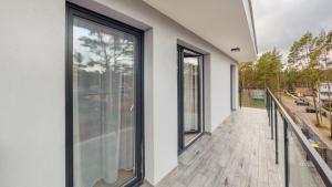 Zdjęcie z galerii obiektu Apartamenty Sun & Snow Baltic Apartments z basenem w Pobierowie