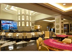 Restoran või mõni muu söögikoht majutusasutuses Kaya Artemis Resort & Casino