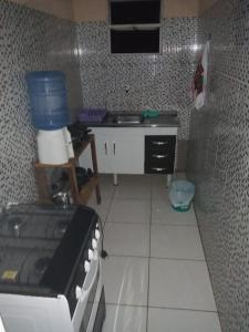 Virtuve vai virtuves zona naktsmītnē Residencial Santos