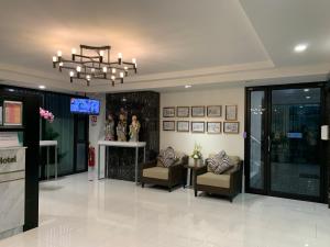 The lobby or reception area at Icare Residence & Hotel