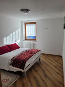 Posteľ alebo postele v izbe v ubytovaní Casa Luca