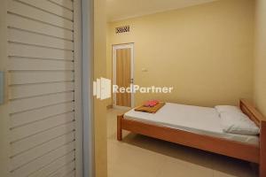 Pasirmuncang 1にあるBatu Homestay Puncak Mitra RedDoorzのギャラリーの写真 +4枚の写真