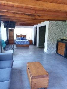 Letto o letti in una camera di Mazamitla Pinos del Rio