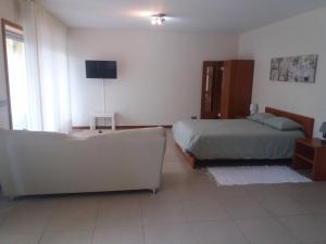 Кровать или кровати в номере Casa Mosteiro