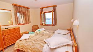 Posteľ alebo postele v izbe v ubytovaní Vacation House Katica