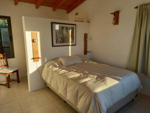 En eller flere senge i et værelse på Cabaña La Joaquina - Villa Giardino + 33 billeder