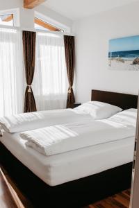 Een bed of bedden in een kamer bij Apartment Maria