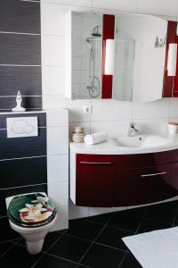 Koupelna v ubytování Apartment Maria + 23 fotografií