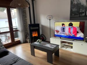 TV a/nebo společenská místnost v ubytování Piso Victoria