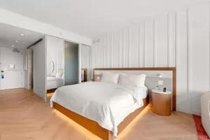 Ένα ή περισσότερα κρεβάτια σε δωμάτιο στο Residences Suite South Beach
