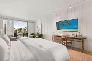 Ένα ή περισσότερα κρεβάτια σε δωμάτιο στο Residences Suite South Beach